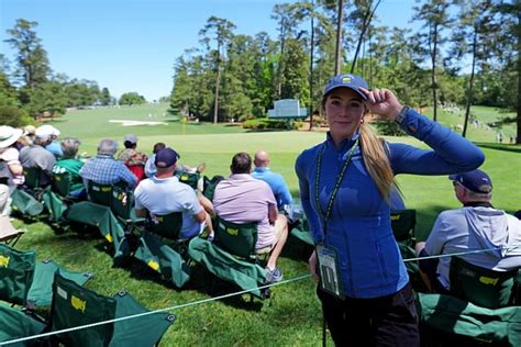 Grace Charis goes golfing in a purple top as she posts slow。